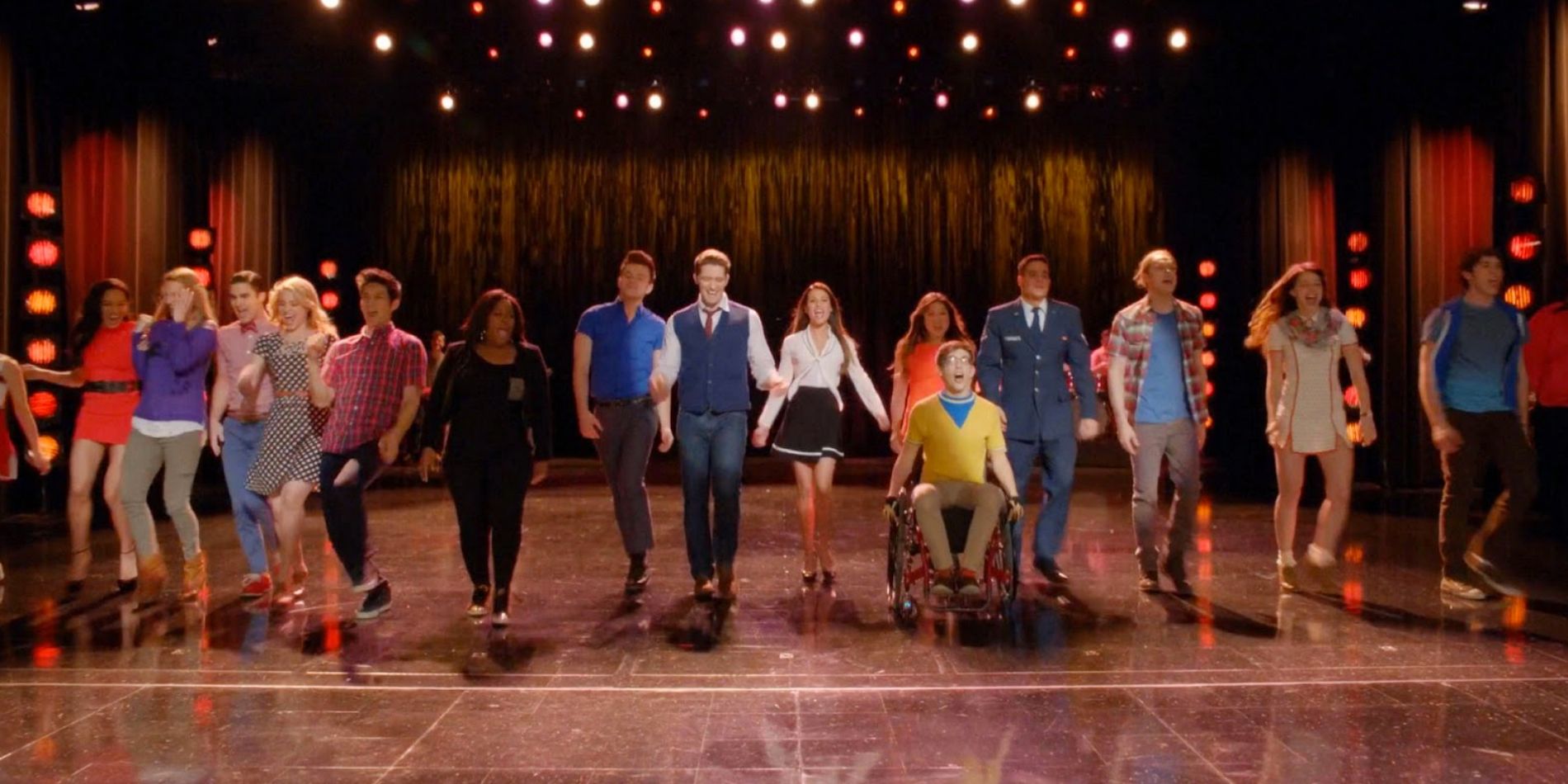 Past and present members of New Directions perform Don't Stop Believing