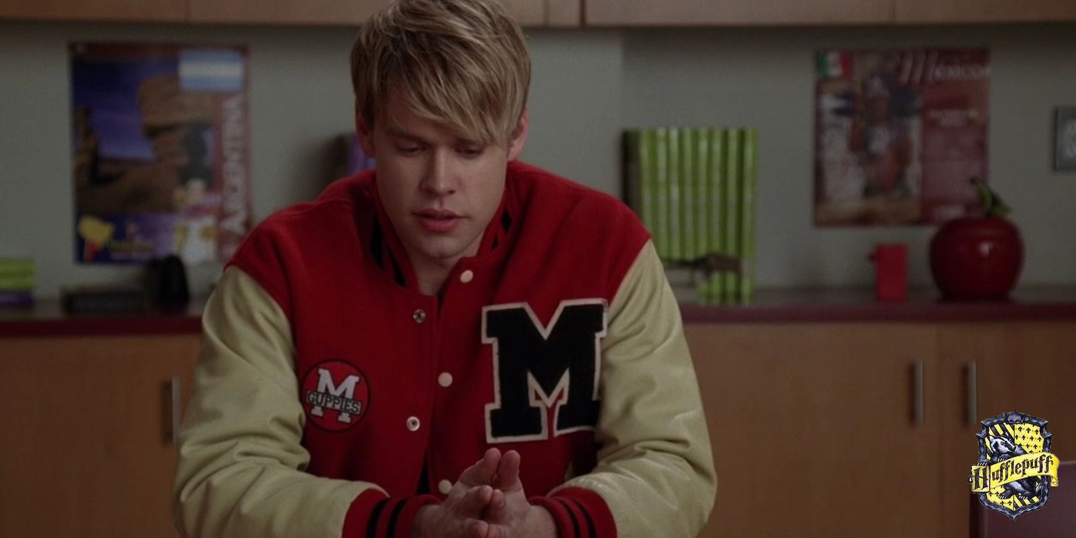 An image of Sam Evans in Glee with the Hogwarts Hufflepuff crest in the lower right corner
