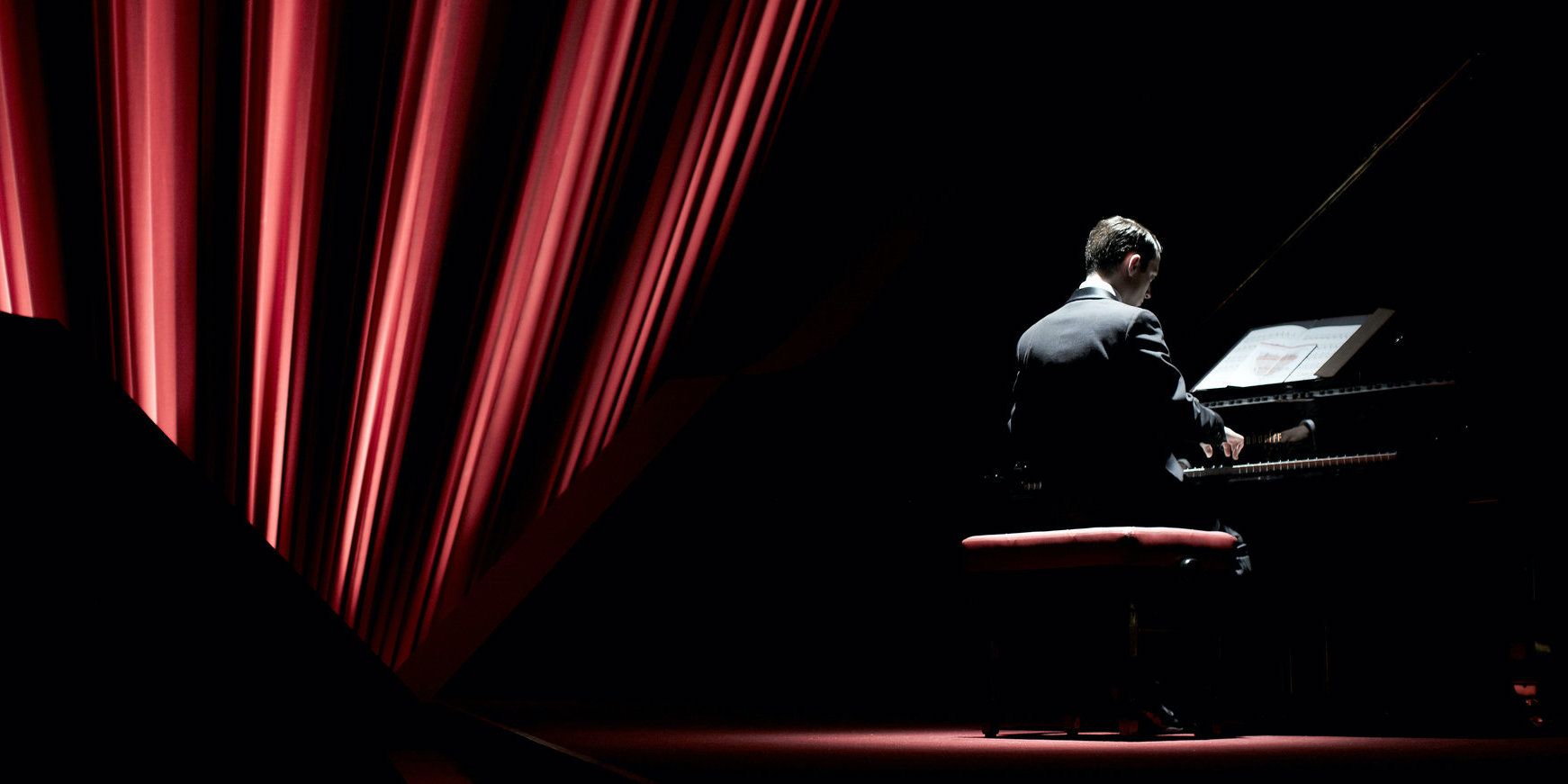 Grand Piano movie Elijah Wood sitting at piano