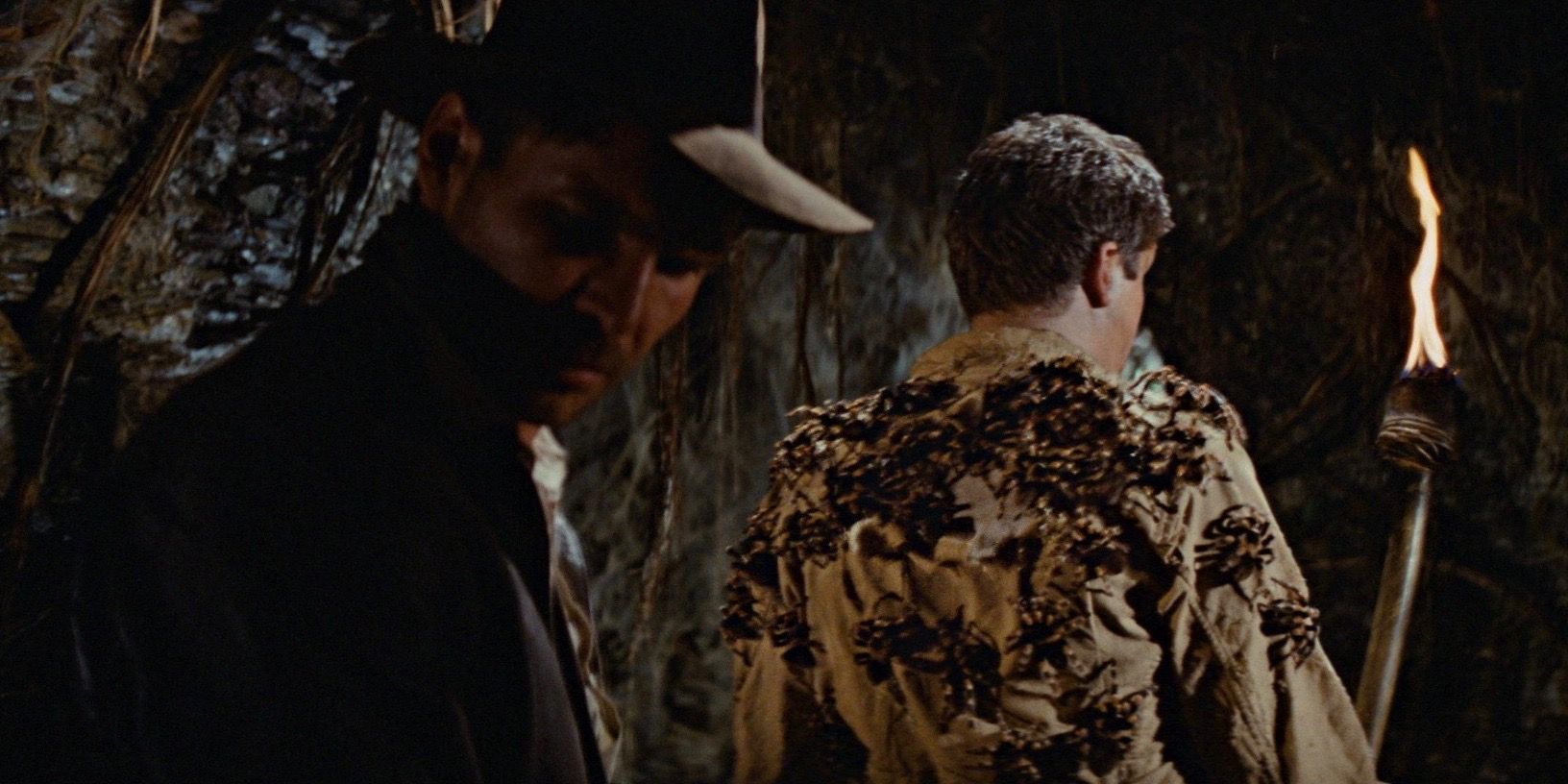 Harrison Ford as Indiana Jones and Alfred Molina as Satipo in Raiders of the Lost Ark