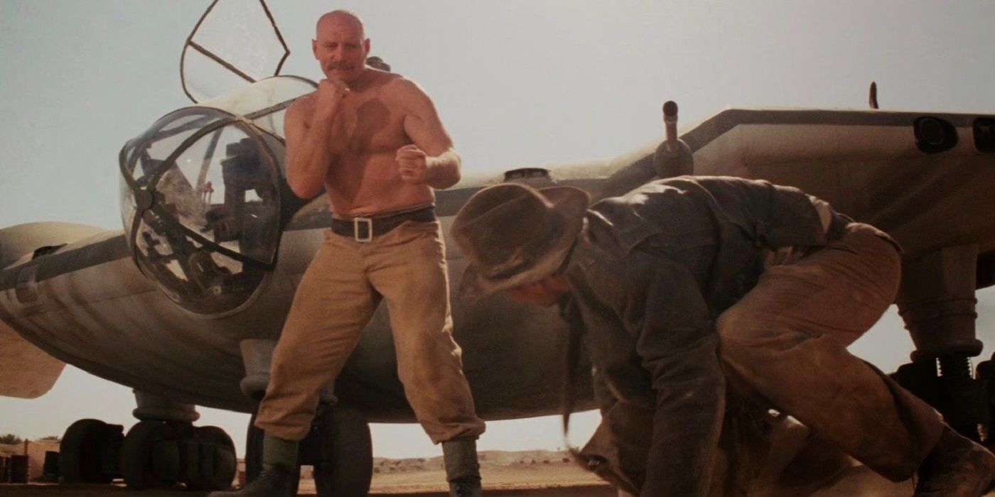 Indiana Jones fighting a mechanic next to a plane in Raiders of the Lost Ark