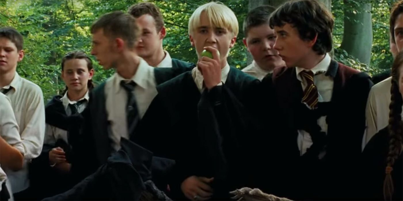 Draco Malfoy eating an apple in Harry Potter and the Prisoner of Azkaban