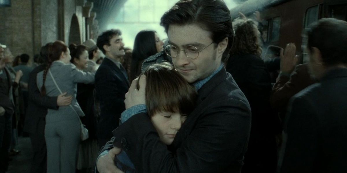 Harry Potter hugging Albus Severus