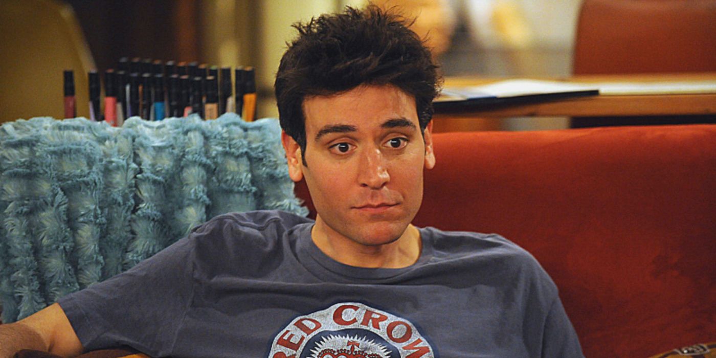 Ted sitting on the couch looking sad on How I Met Your Mother