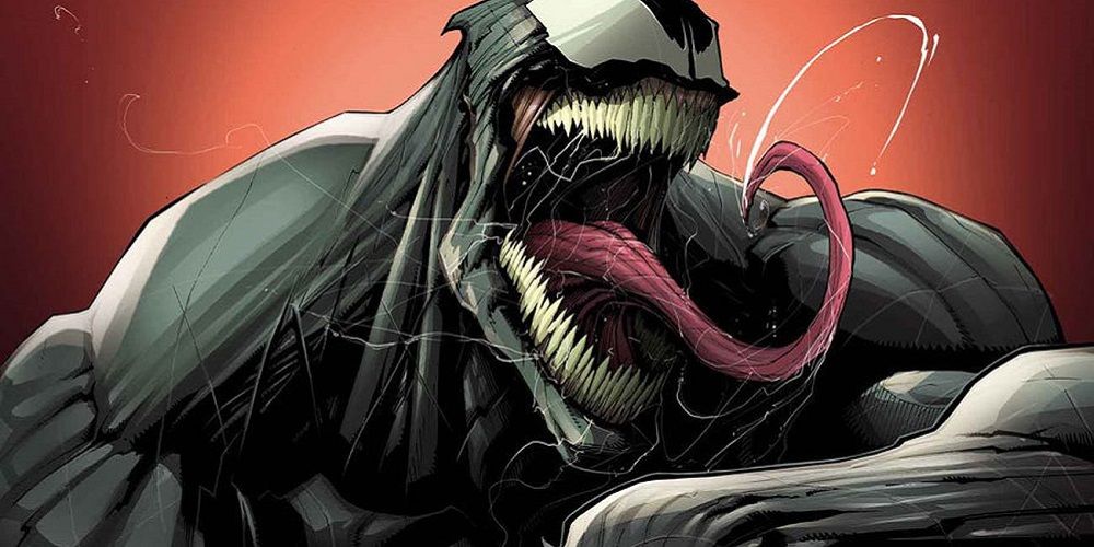 Lee Price as Venom roaring and sticking out his tongue