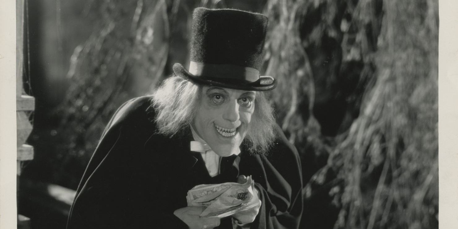 A man is hunched over with hollowed eyes and a top hat.