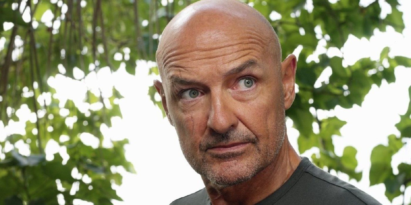 John Locke from Lost looking slightly off camera.