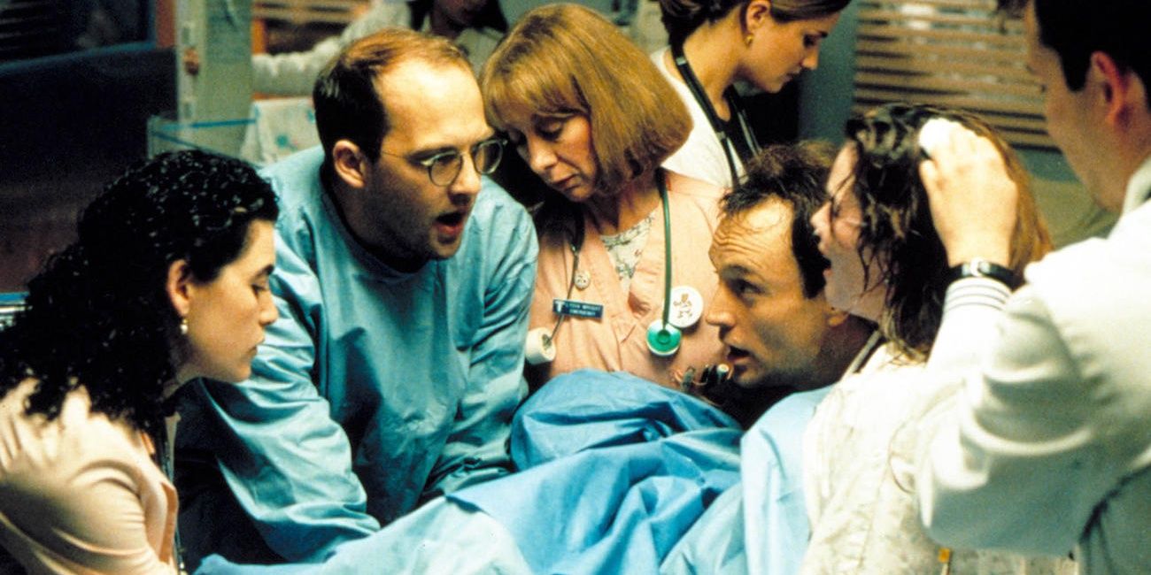 The cast of ER delivering a baby in an episode.