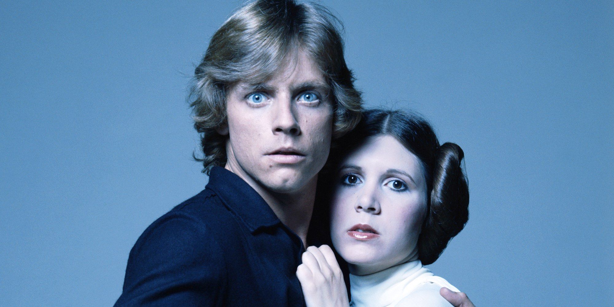 Mark Hamill as Luke Skywalker and Carrie Fisher as Princess Leia in Star Wars