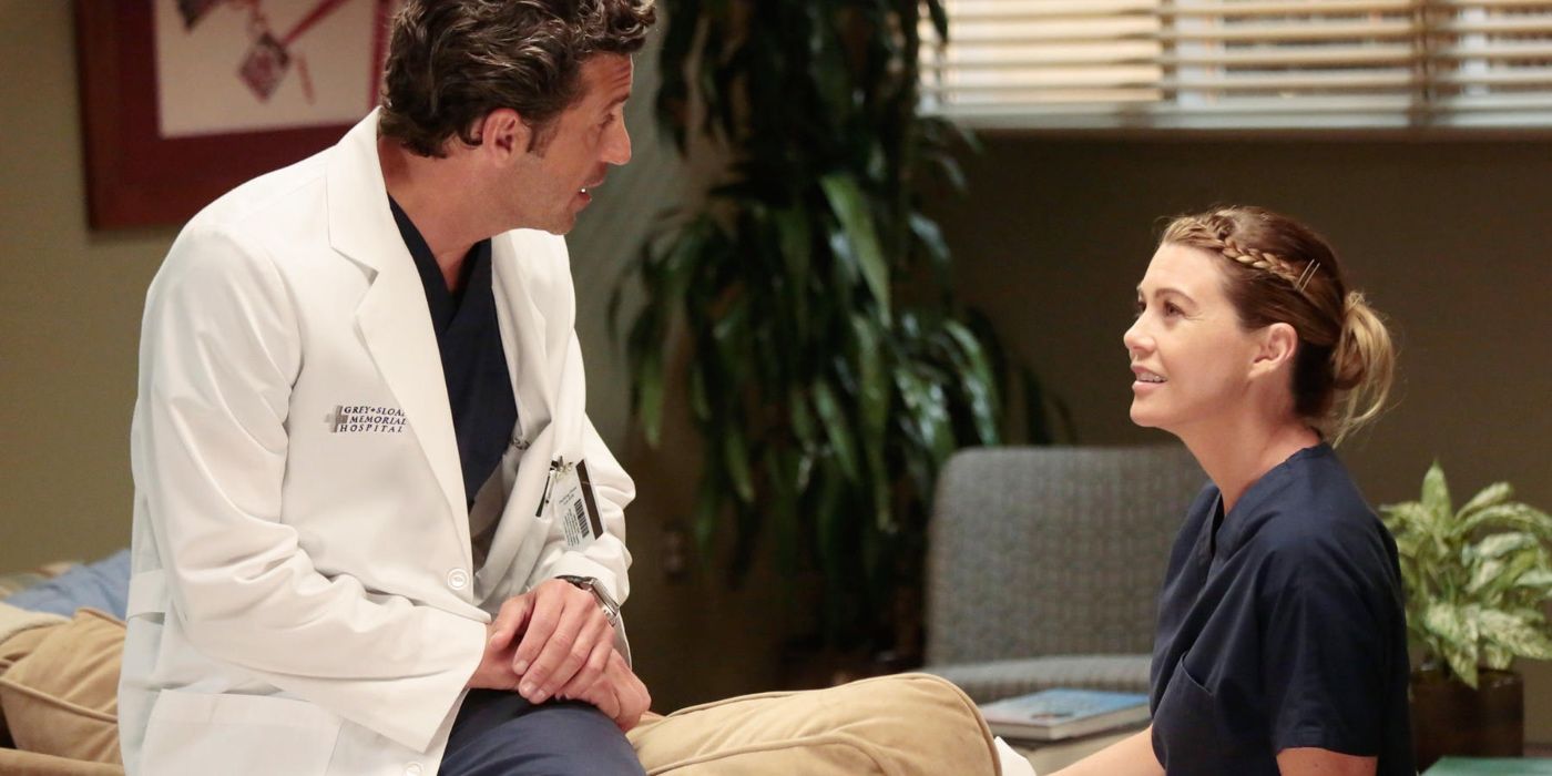 Meredith and Derek sitting and talking.