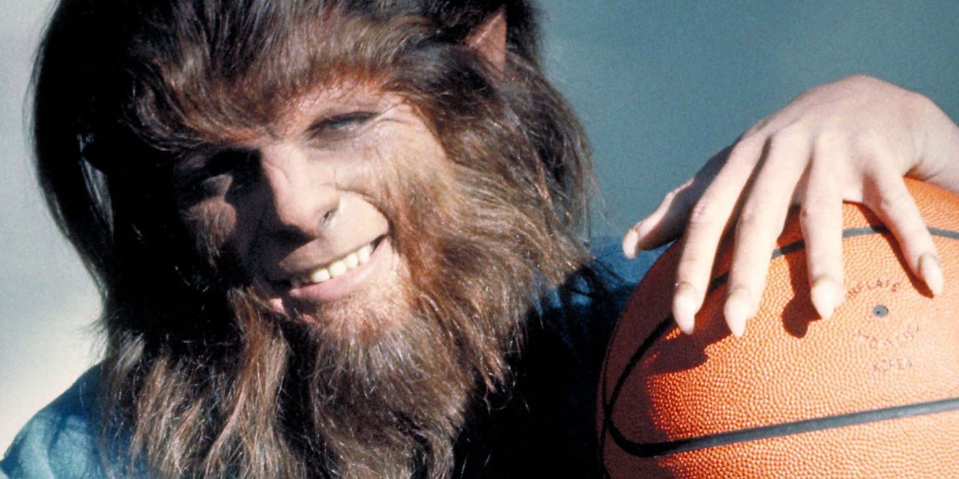 The Teen Wolf poses with a basketball 