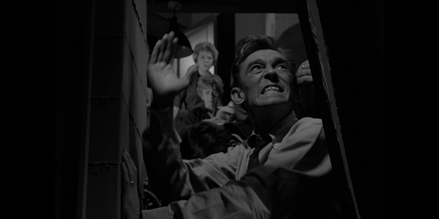 Still from the Twilight Zone episode The Shelter of people in a doorway