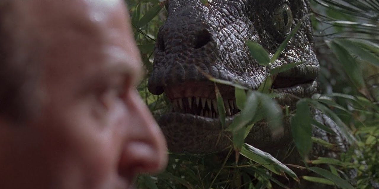 Muldoon about to be eaten by a velociraptor in Jurassic Park
