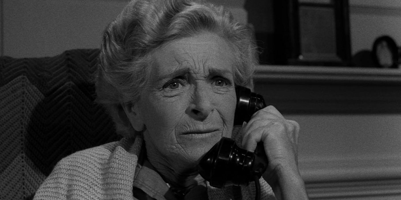 Still from the Twilight Zone episode Night Call of an old woman answering the phone