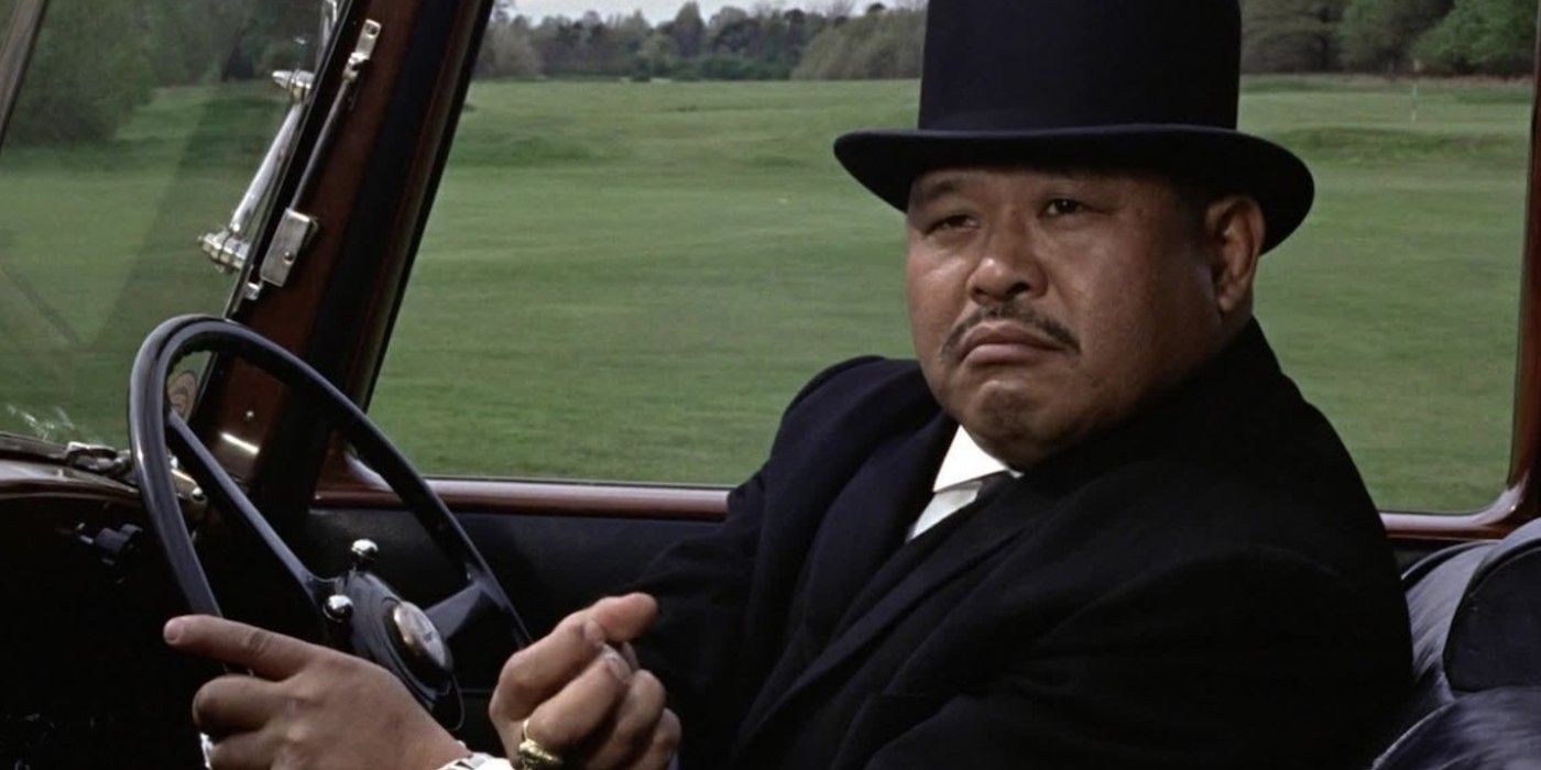 Oddjob crushes a pool ball with his hand from Goldfinger 