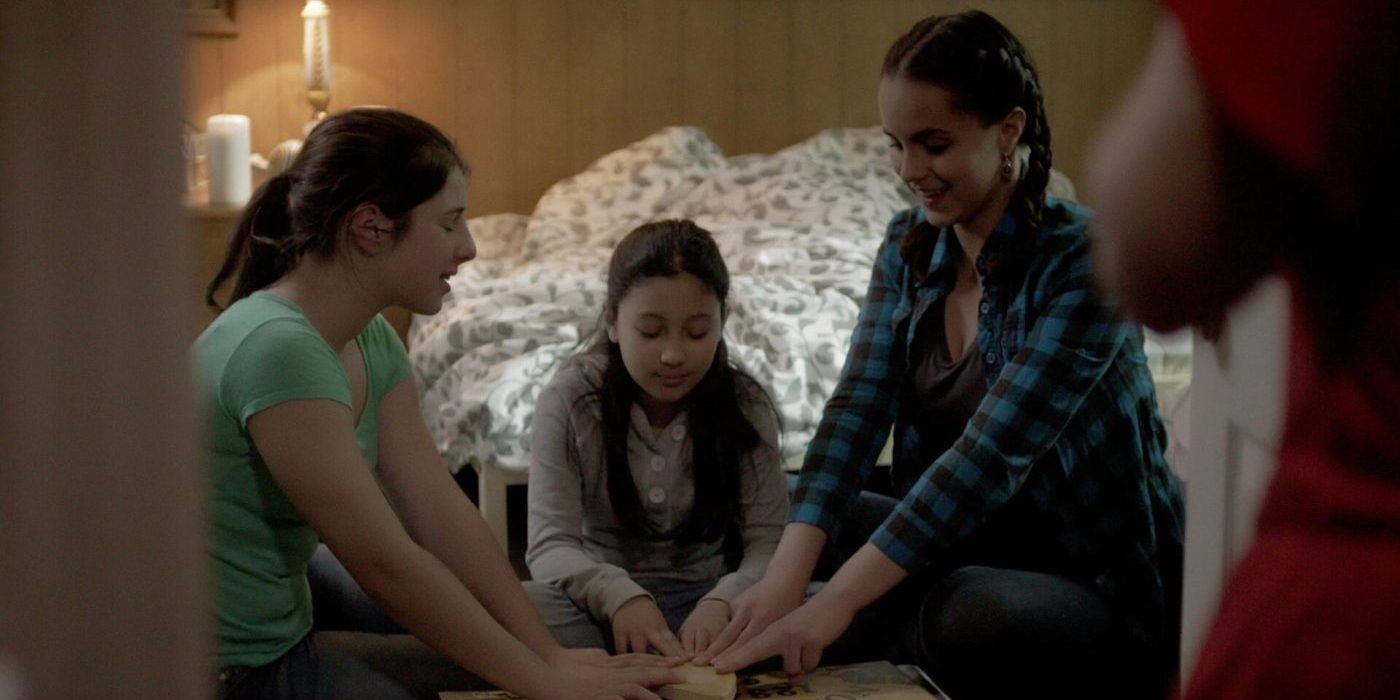 A family uses a ouija board in Paranormal Witness 