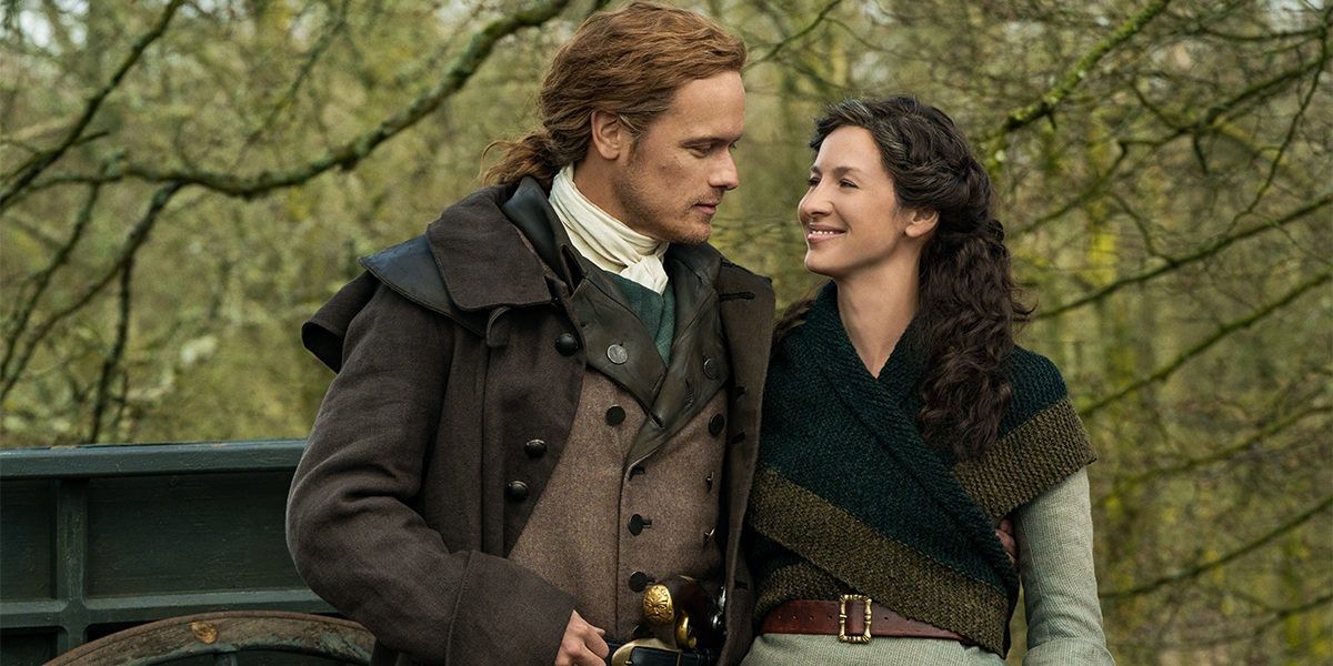 Aged Jamie and Claire smiling Outlander