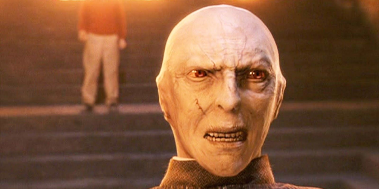Richard Bremmer as Lord Voldemort appearing on the back of Quirrell's head in Harry Potter