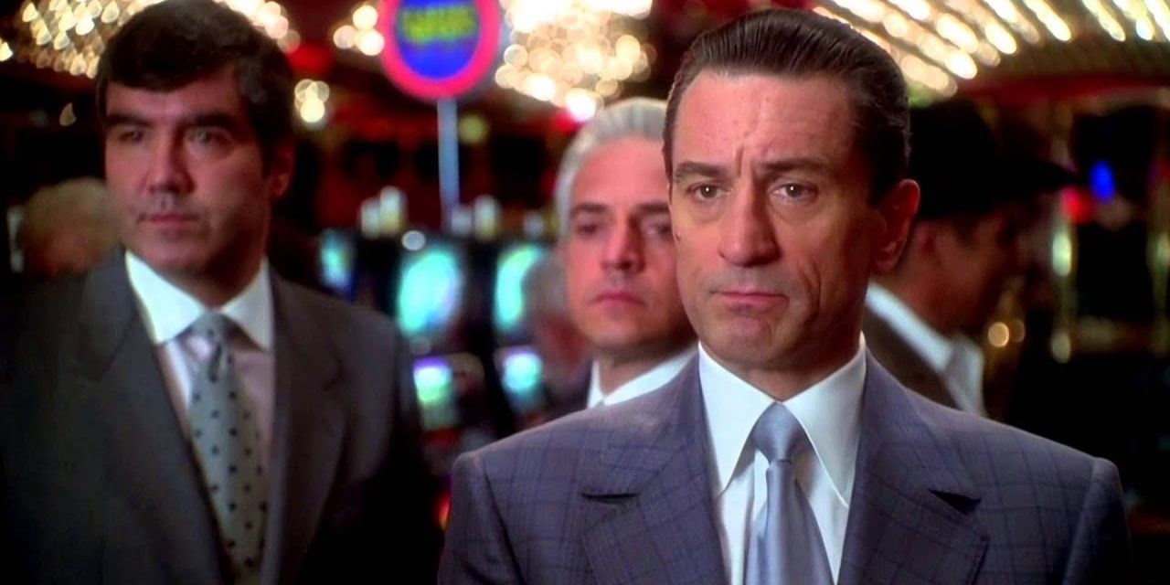 Robert De Niro looks upset on the casino floor in Casino