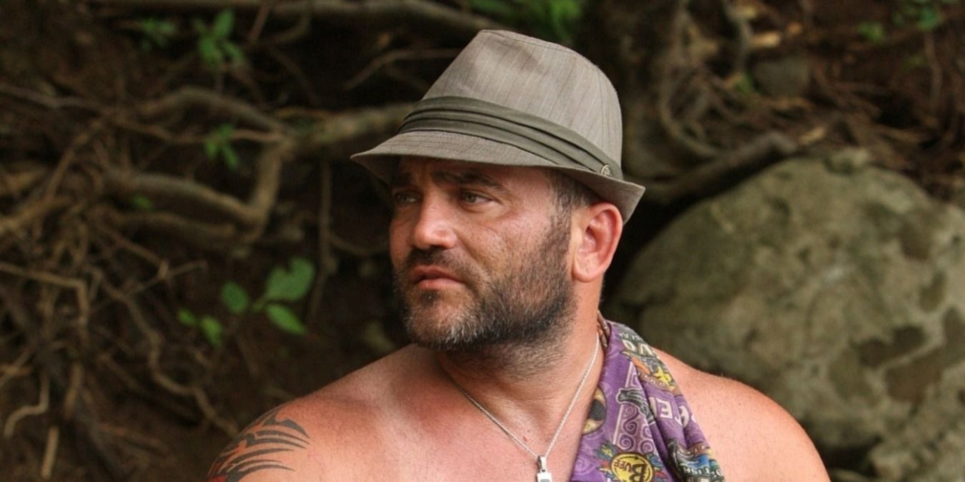 Russell looking to the side in Survivor.