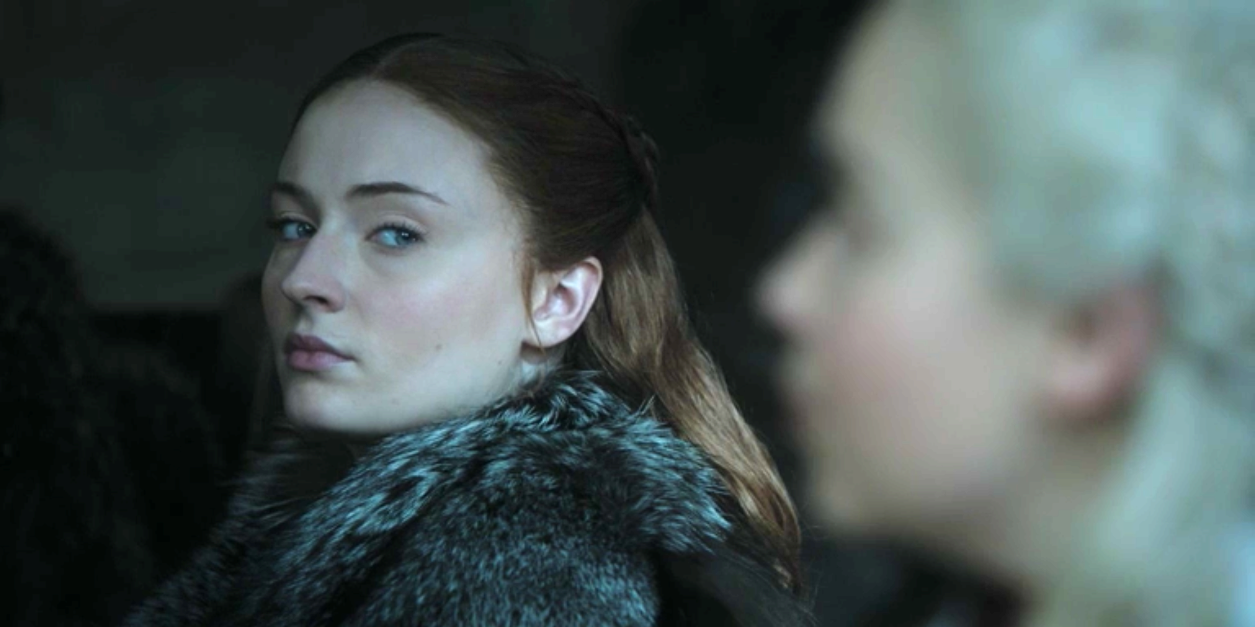 Sansa Stark glares at Daenerys Targaryen.