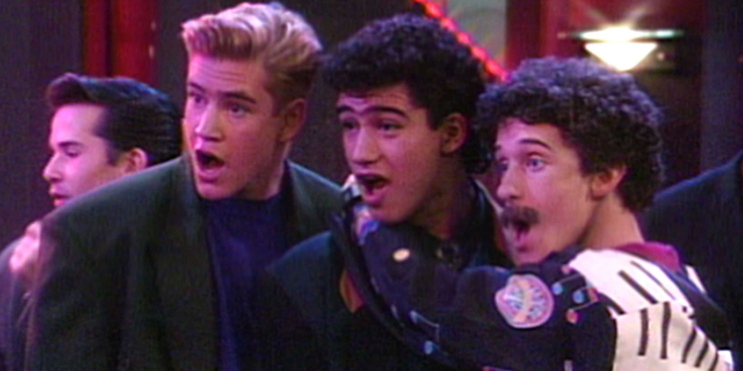 Zack, Slater, and Screech are surprised in a club in Saved By The Bell