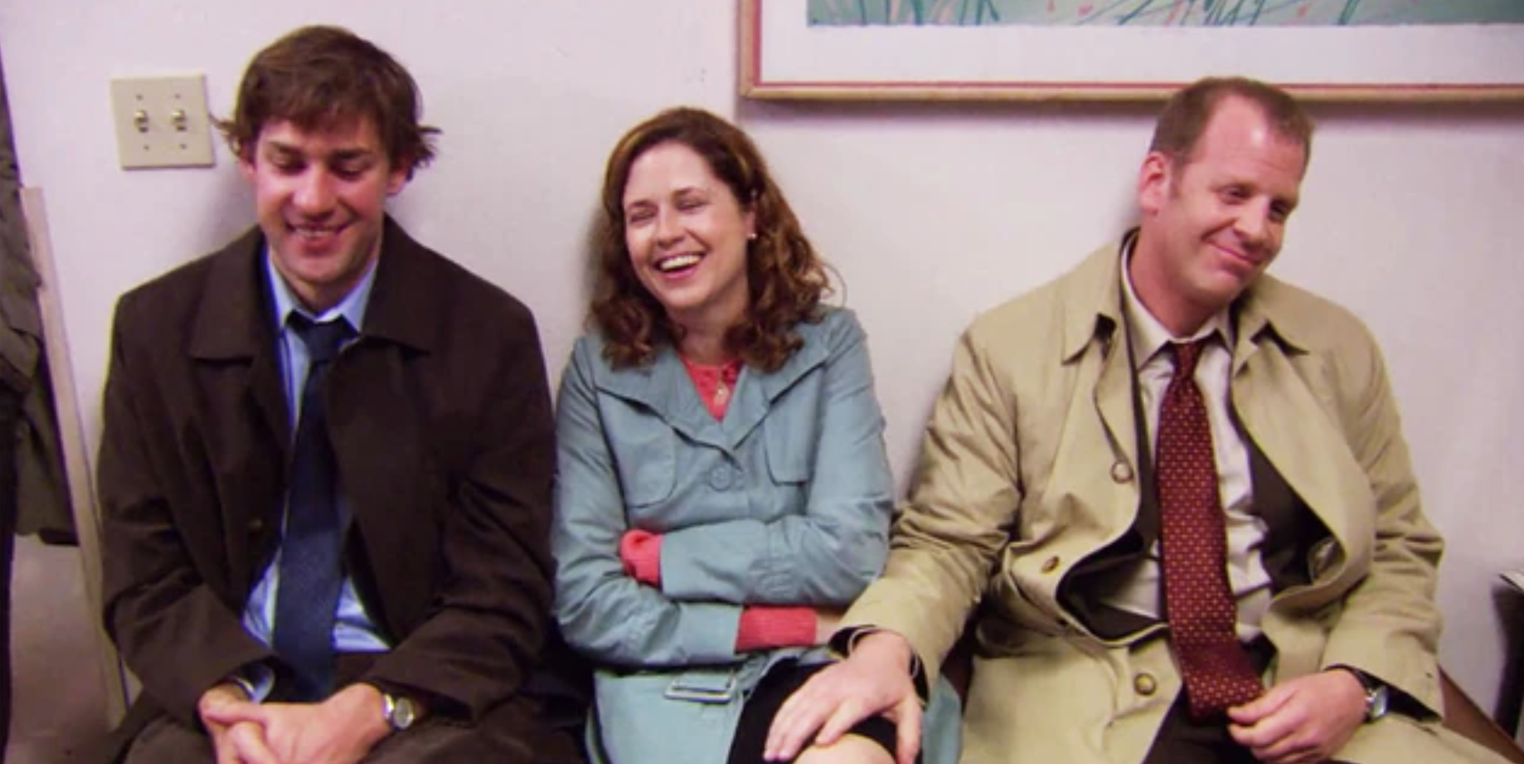 Toby touches Pam's leg as they all sit with Jim in The Office.