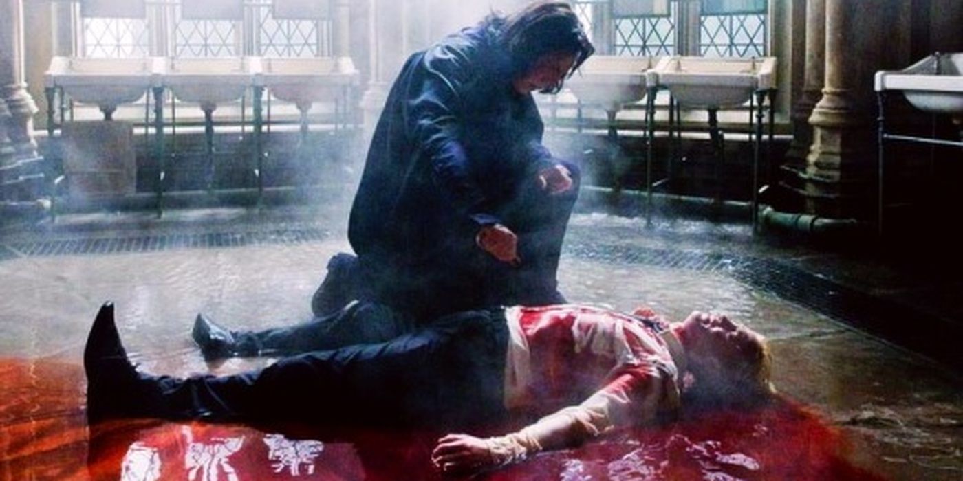 Draco lying on the bathroom floor in a pool of blood