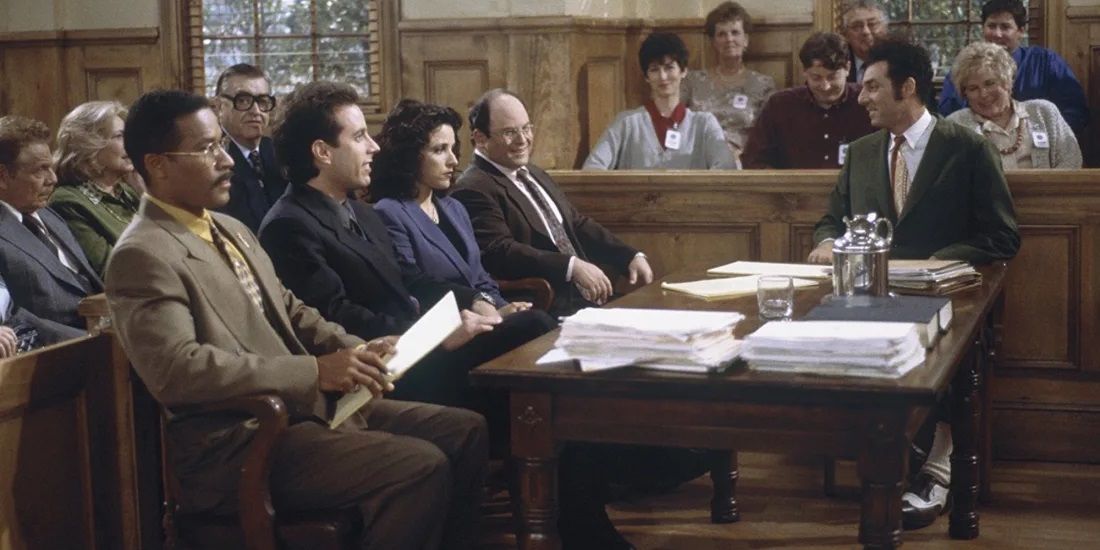 The main characters sitting in court in the series finale of Seinfeld