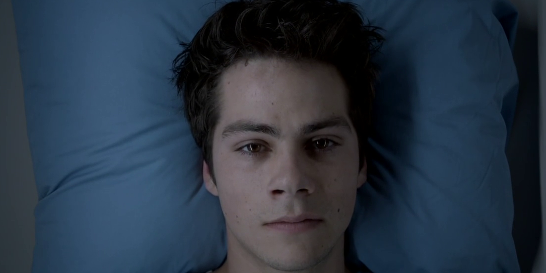Stiles lays on a pillow for a scan in Teen Wolf