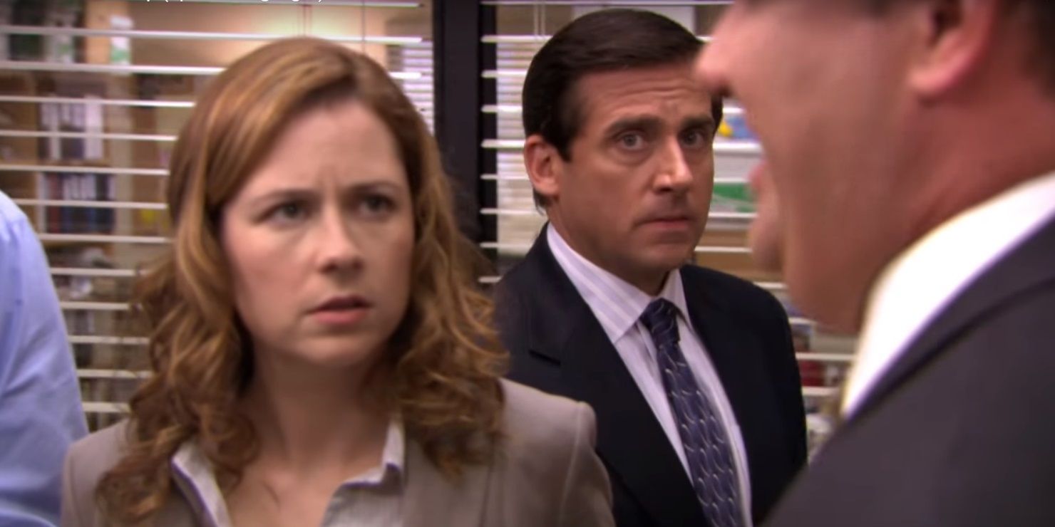 Michael (Steve Carell) looking nervously at Pam and Kevin in The Office episode "Gossip"