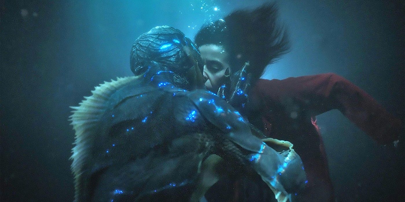 Elisa and Amphibian Man kiss in The Shape Of Water