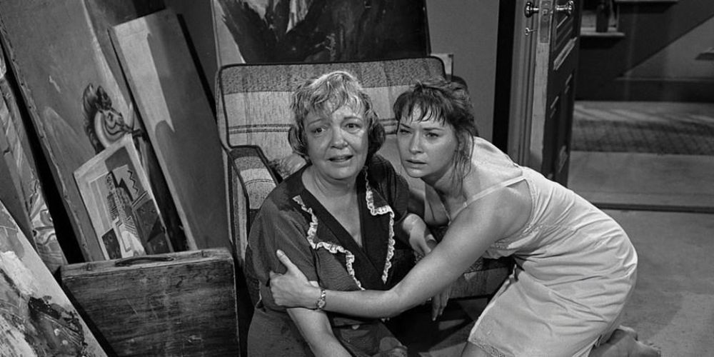 Still from the Twilight Zone episode The Midnight Sun of two women on the floor together