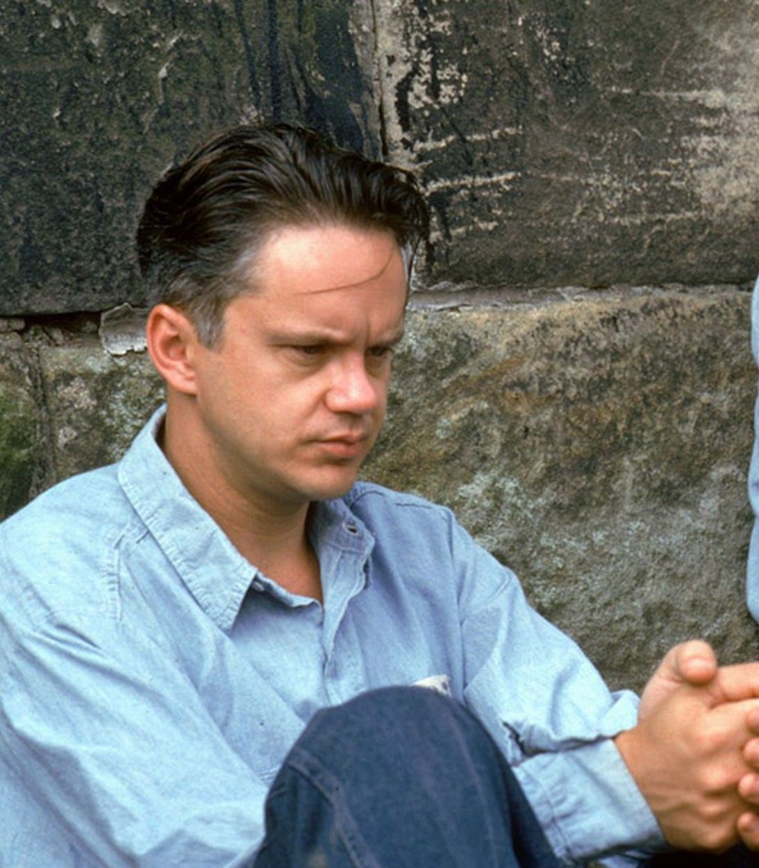 Tim Robbins as Andy Dufresne and Morgan Freeman as Red in The Shawshank Redemption vertical
