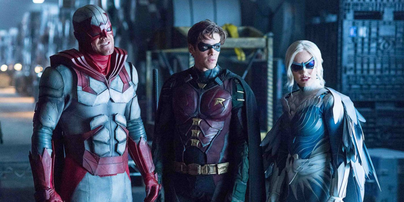 Robinm, Hawk, and Dove standing together in Titans