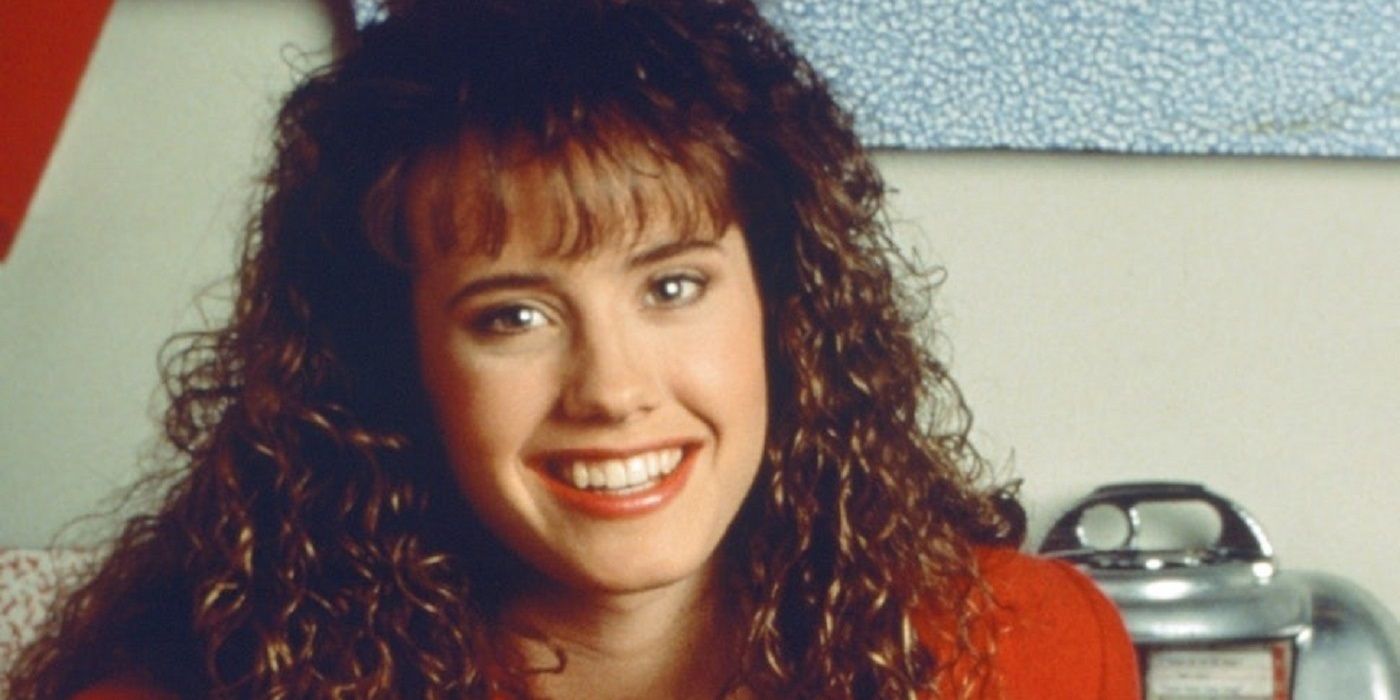 Tori Scott smiling in a promotional image from Saved By The Bell