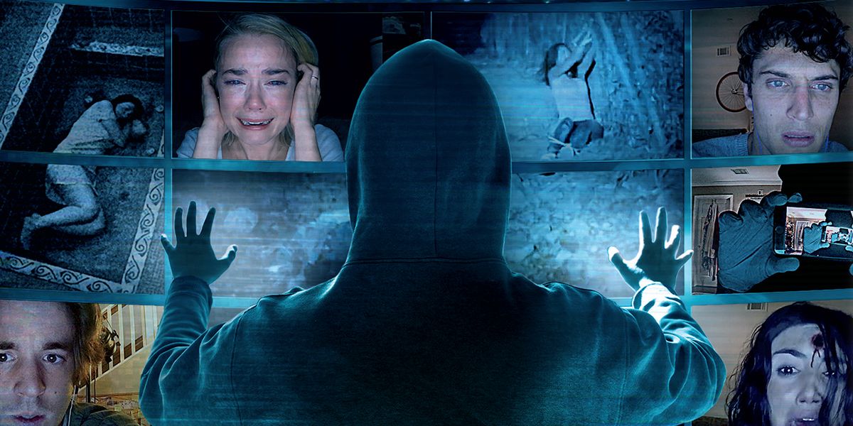 A person wearing a hood staring at a computer screen in Unfriended: Dark Web
