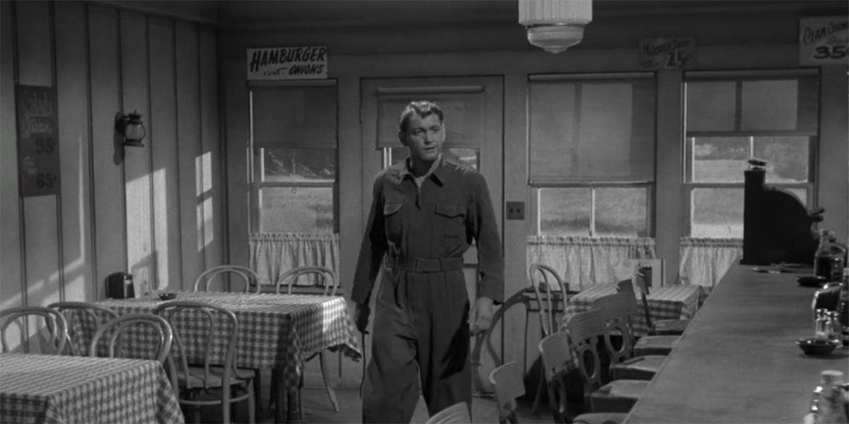 A still from the Twilight Zone episode Where Is Everybody of a man alone in a diner