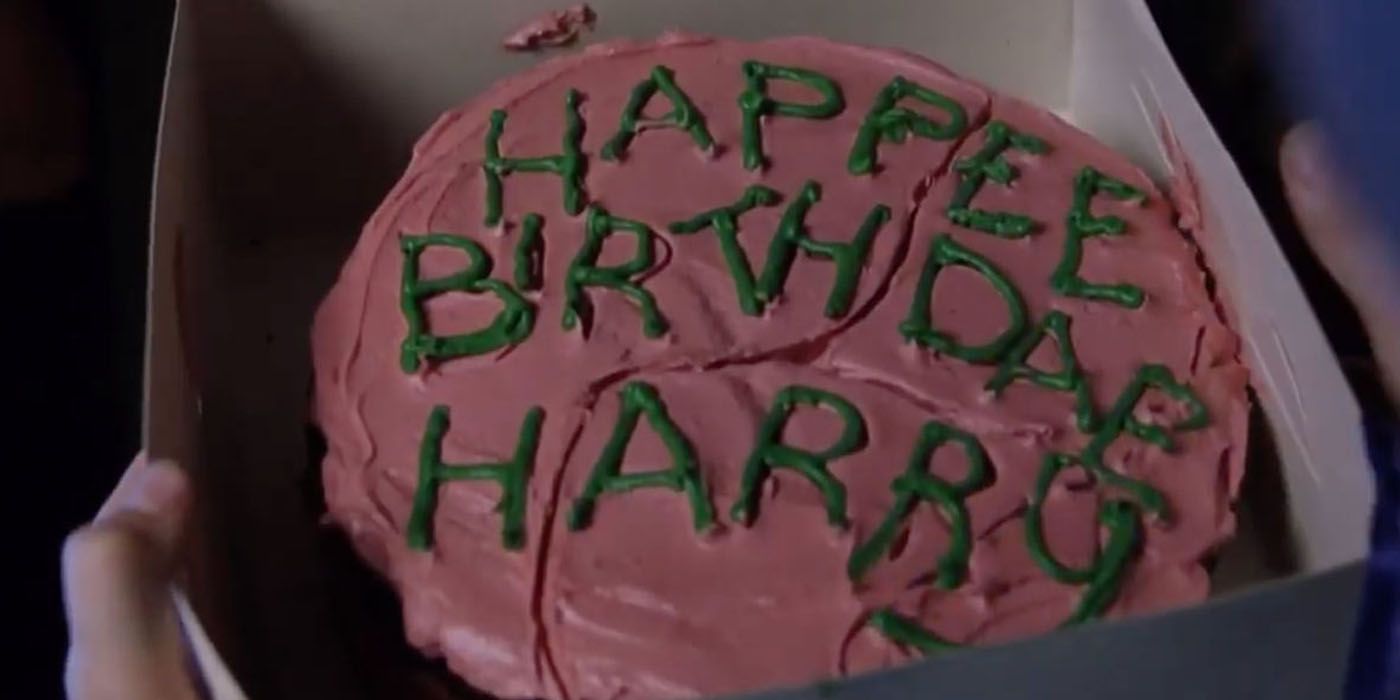 Hagrid makes Harry Potter a birthday cake that reads Happee Birthdae Harry