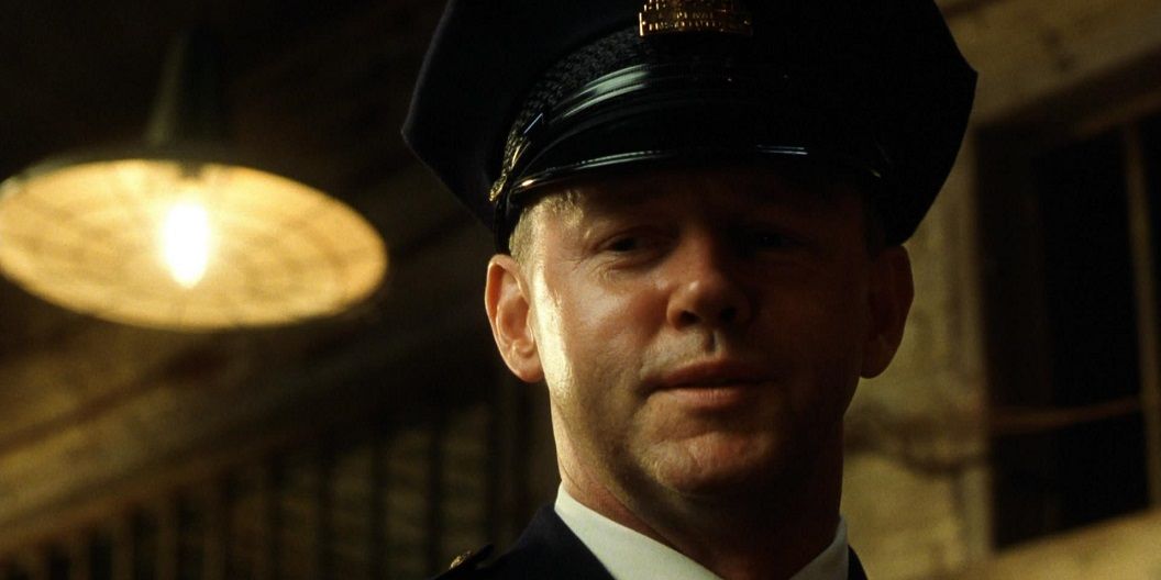 David Morse looking down and smiling in The Green Mile