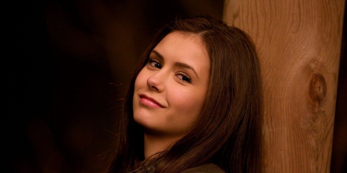Elena Gilbert smiling at the camera with her head tipped back