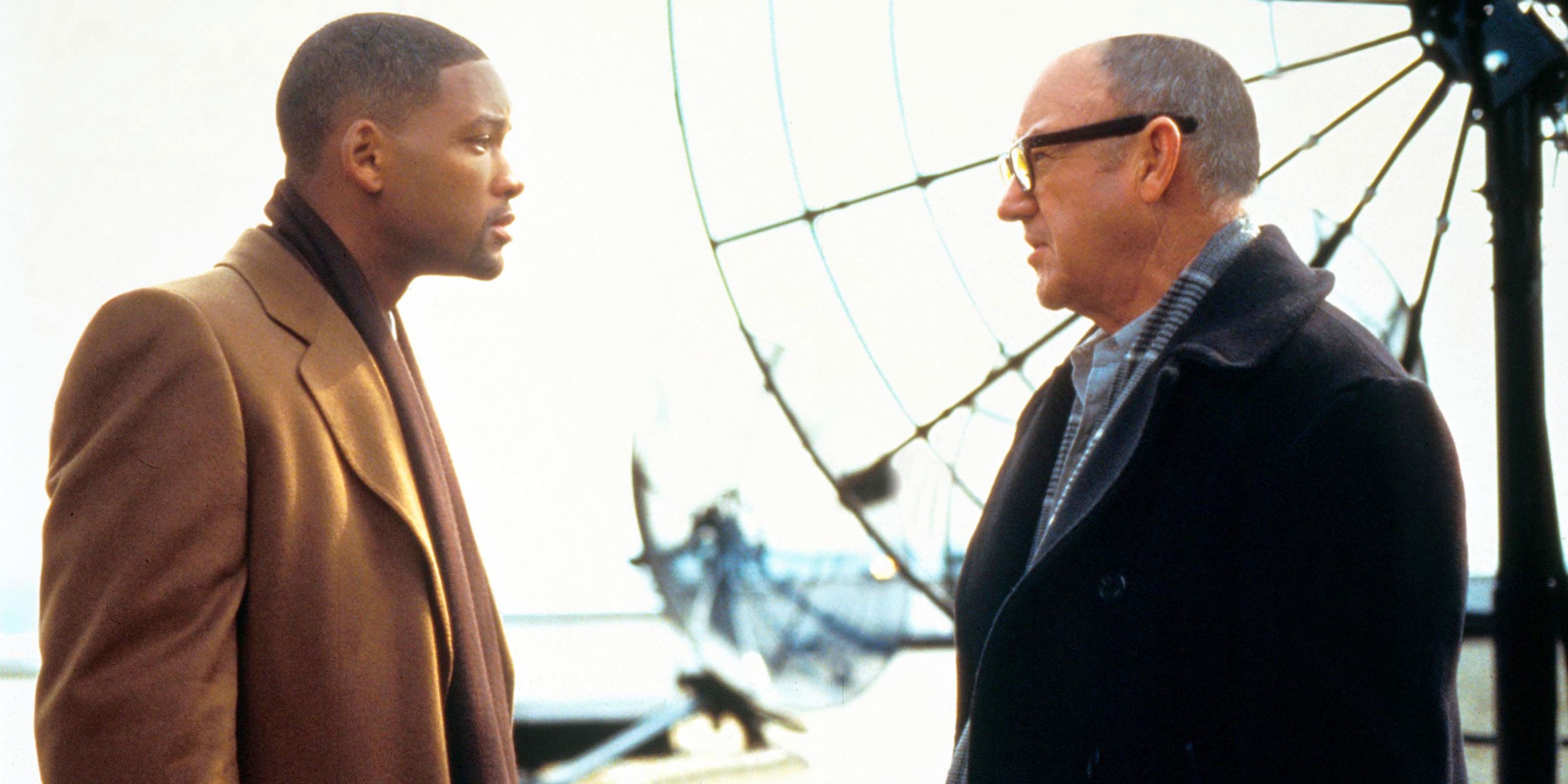 Will Smith and Gene Hackman standing on a roof in Enemy of the State (1998)