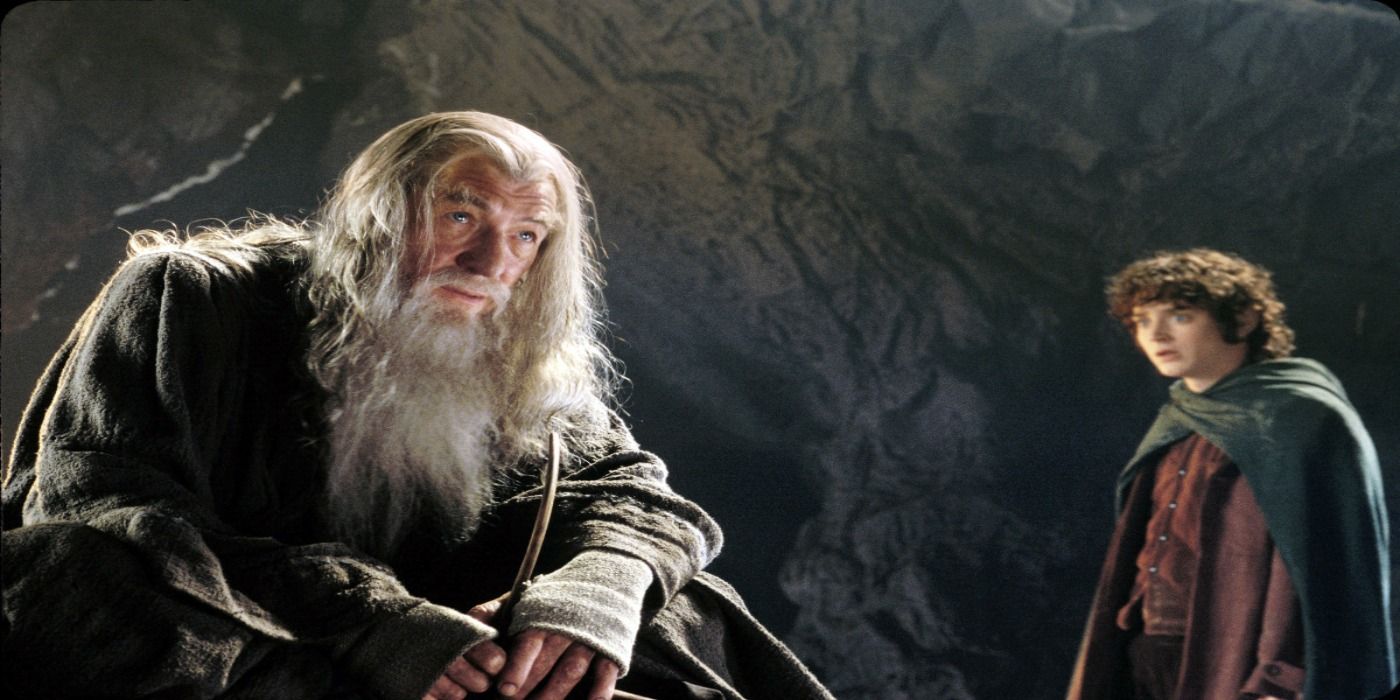 Gandalf smoking a pipe with Frodo in the background