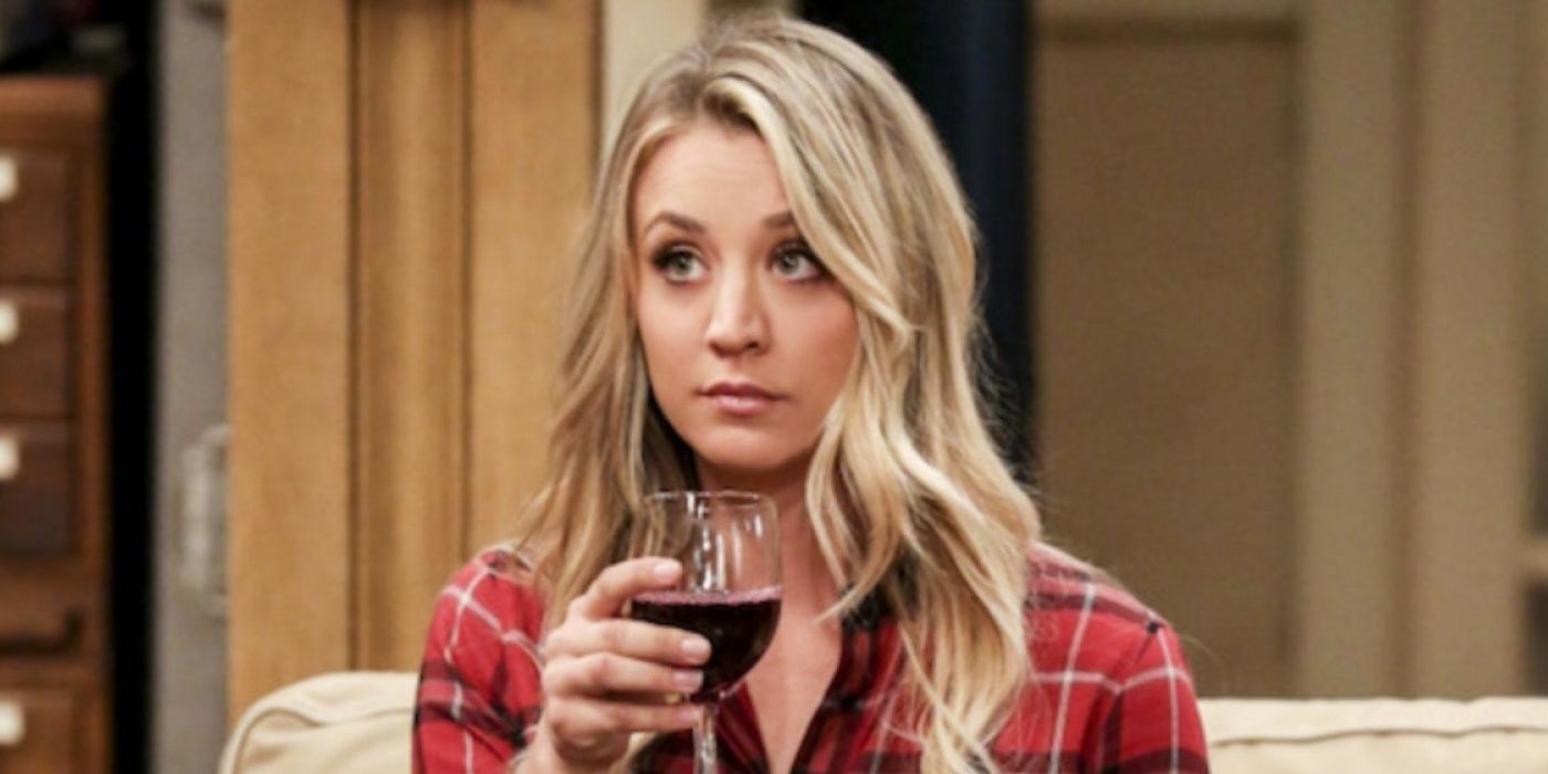 Penny with a glass of wine in The Big Bang Theory