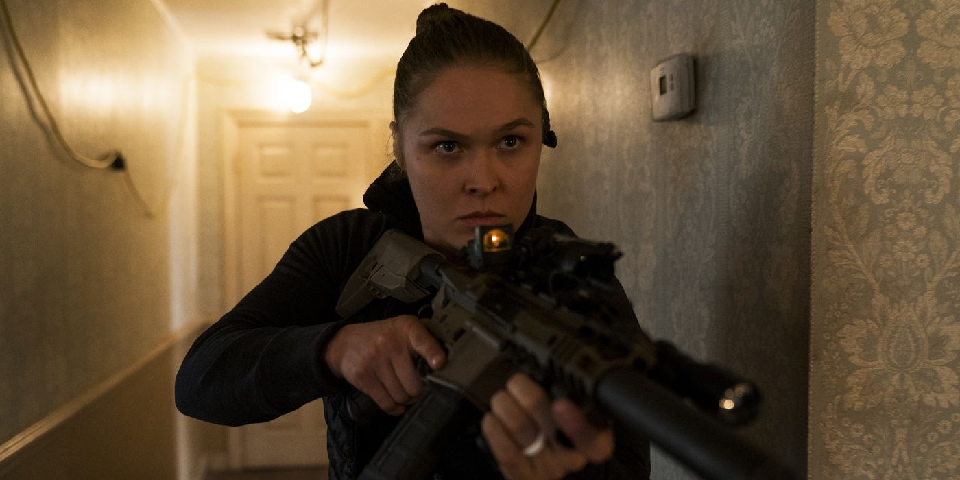 Ronda Rousey with a gun in Mile 22.