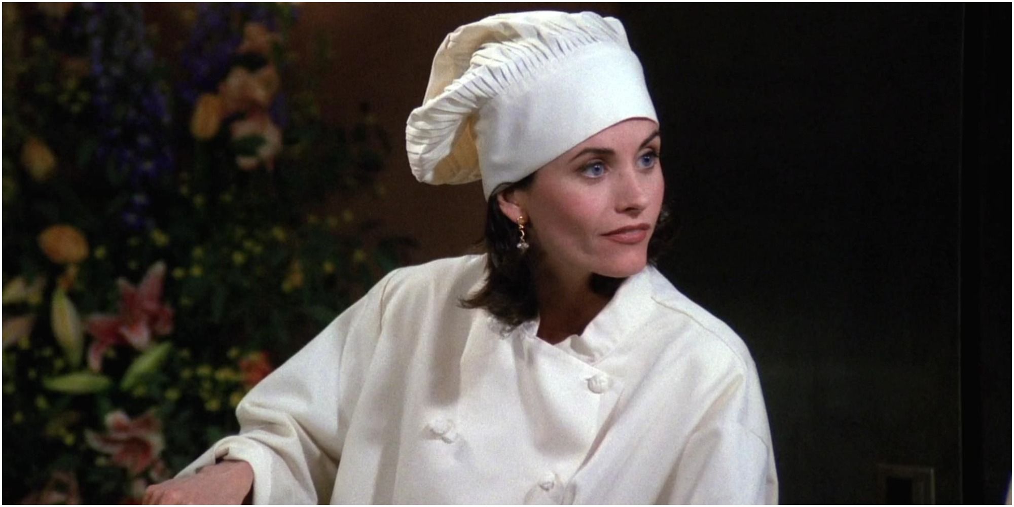 Monica wearing a chef's hat and outfit on Friends
