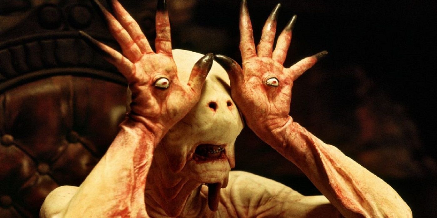 An image of the Pale Man being woken up in Pans Labyrinth
