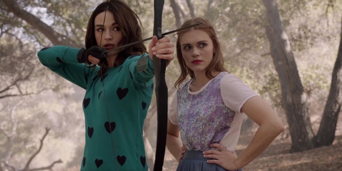 Allison practising archery while Lydia watches in Teen Wolf