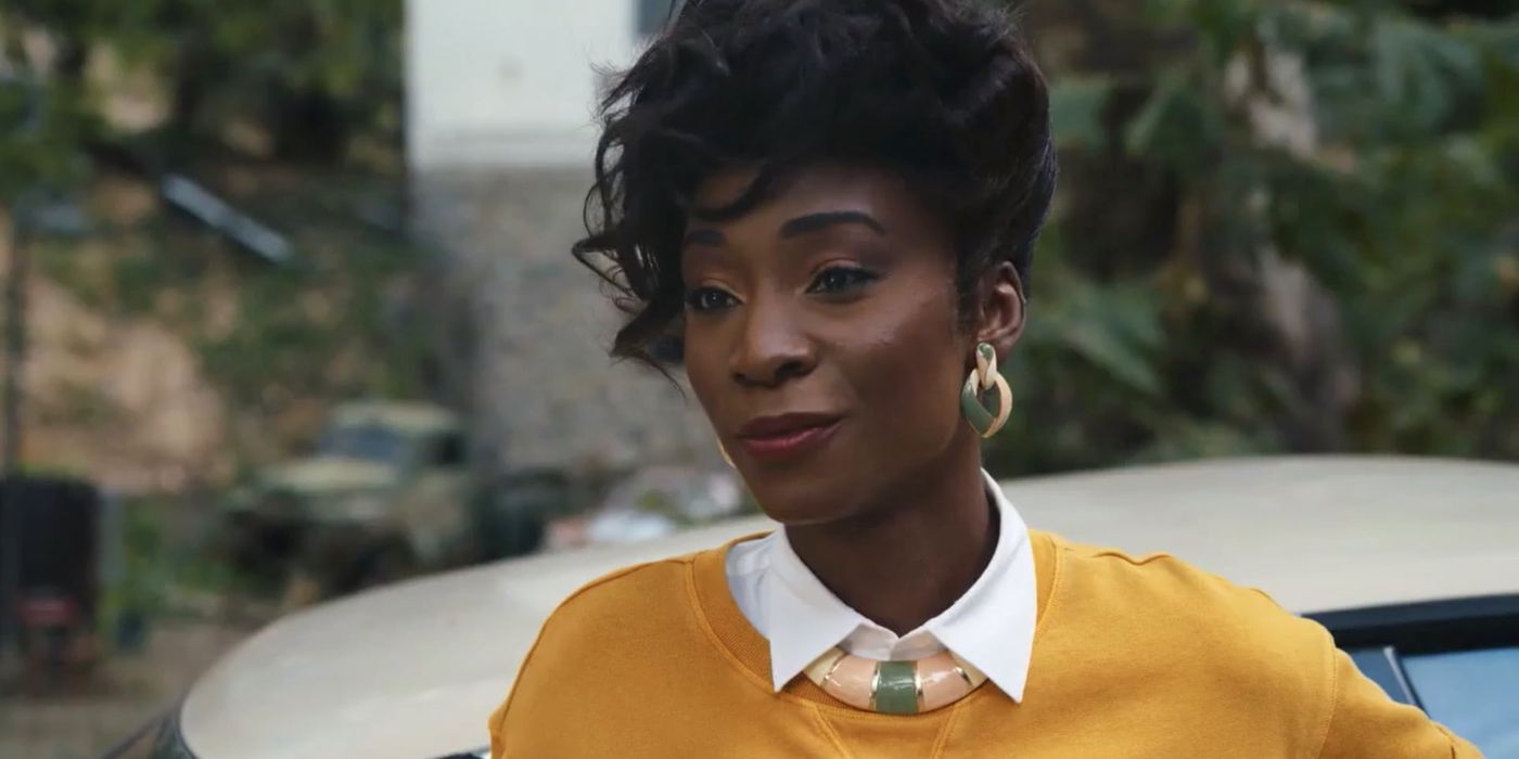 Donna Chambers (Angelica Ross) in a yellow sweater in American Horror Story 1984