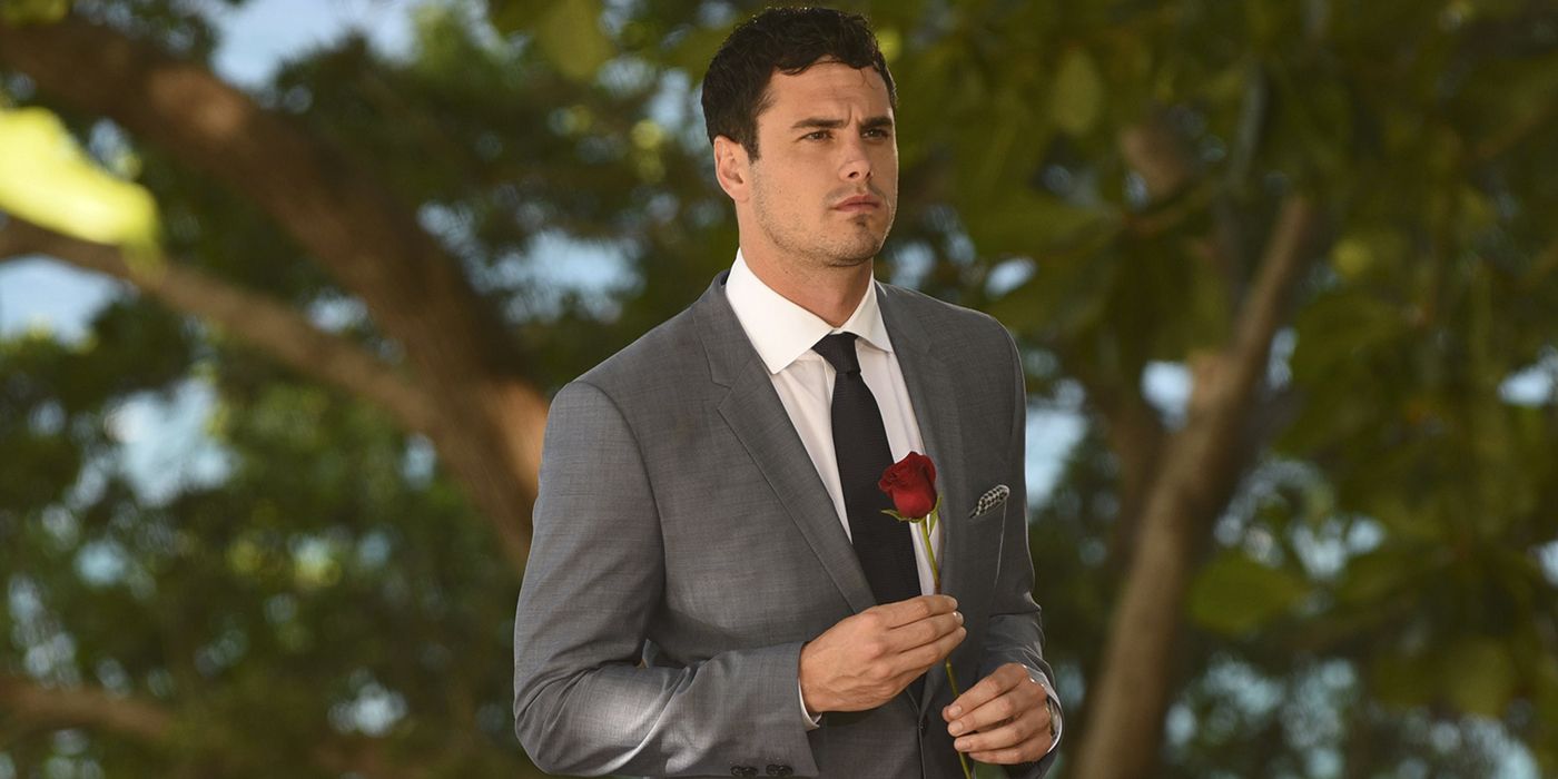 Ben Higgins on The Bachelor holding a rose